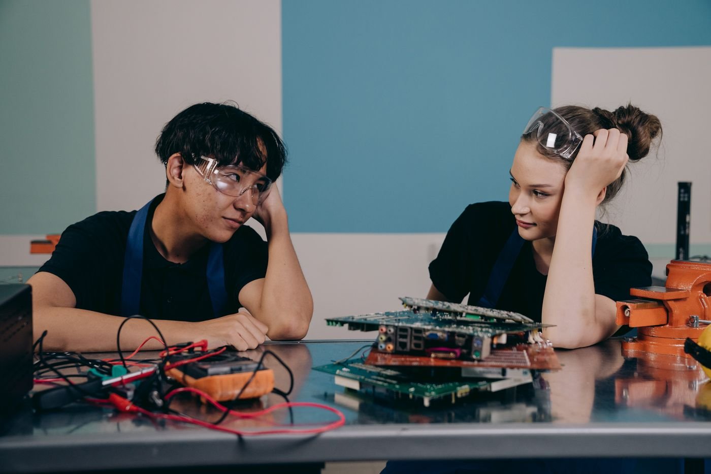 Engineers collaborating on an electronics prototype